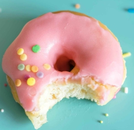 pink doughnut with bite